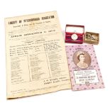 An Elizabeth II Coronation medal 1953, together with a souvenir program of the celebrations in the c