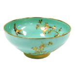 A late 20thC Spode porcelain fruit bowl, decorated with exotic birds against a sea green ground, pri