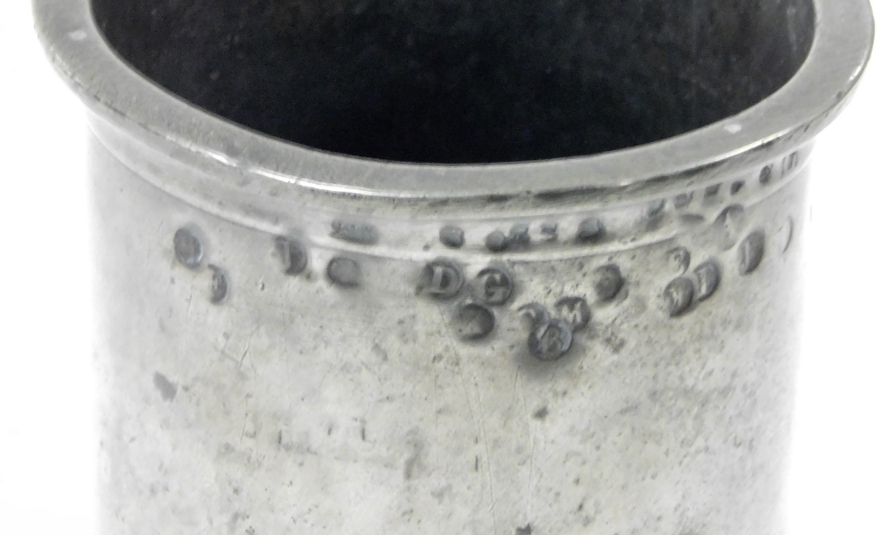 A 19thC pewter tankard, with a protruding rim, bearing various stamps, on a stepped base, stamped to - Image 3 of 3
