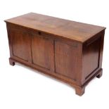 A 19thC oak blanket chest, with a triple panelled front, raised on bracket feet, 73cm high, 132cm wi