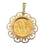 A George V gold half sovereign 1911, in a 9ct gold pendant mount, 5.8g all in.