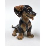 A Royal Copenhagen porcelain figure of a Dachshund, number 078, printed and painted marks.