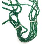A rough faceted emerald bead multi strand necklace, five graduated strands of beads with four tiny w