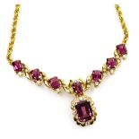A tourmaline and diamond set necklace, seven stones of 6.5mm x 4.9mm rectangular facet cut and one o