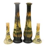 A pair of early 20thC C1ontinental Daum style glass vases, decorated with trees beside a river, 14½c