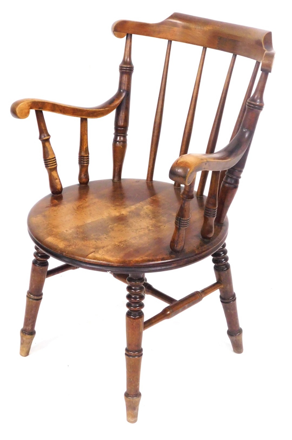 A Victorian oak and beech carver chair, with a curved crest rail, spindle back, circular solid seat