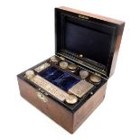A Victorian walnut cased toilet set, for Mansfield of Dublin, with mother of pearl and abelone escut