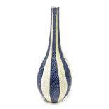 A mid century Poole pottery vase, of slender neck bulbous form, decorated with bands of repeating la