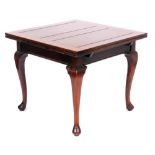 An early 20thC mahogany draw leaf dining table, raised on cabriole legs, 74cm high, 91cm wide, 91cm