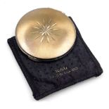A Kigu silver compact, with engraved star burst and engine turned decoration, with slip case, London