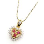 A heart shaped ruby diamond set pendant on chain, three small rectangular rubies surrounded by tiny