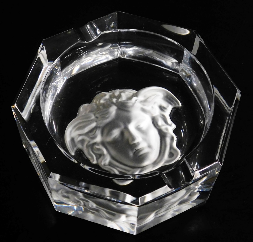 A Rosenthal Versace cut glass ashtray, of octagonal form, with a frosted cameo glass Versace emblem