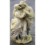 A composition garden statue, of two lovers in Regency dress, 63cm high.