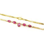A cabachon ruby set chain necklace, five rubies interset with six tin diamonds to a medium curb link