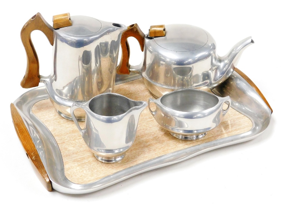 A Picquot ware five piece teaset, comprising a twin handled tray, teapot, hot water jug, cream jug a