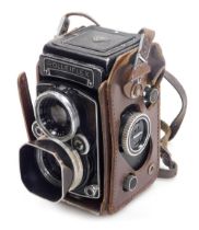 A Franke and Heidecke Rolleiflex twin lens reflex camera, with a Carl Zeiss planar 1:2,8 lens, and a