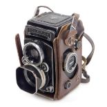 A Franke and Heidecke Rolleiflex twin lens reflex camera, with a Carl Zeiss planar 1:2,8 lens, and a