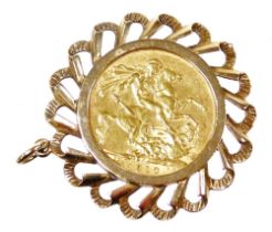 An Edward VII gold full sovereign 1910, in a 9ct gold pendant mount, 13.4g.