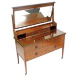 A Warings Edwardian mahogany and banded dressing chest, with a swing frame mirror inset with rectang