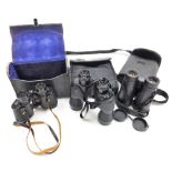 A pair of Asahi Pentax Prism 8x30 field binoculars, no.4617365, a pair of Steiner 8x40 binoculars, a