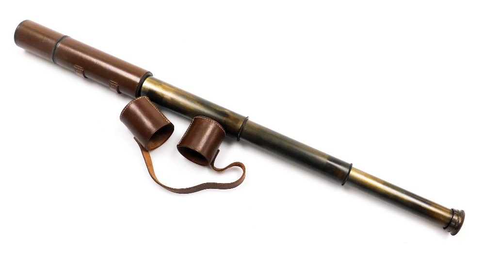 A JH Steward Marksman three drawer telescope, leather cased.