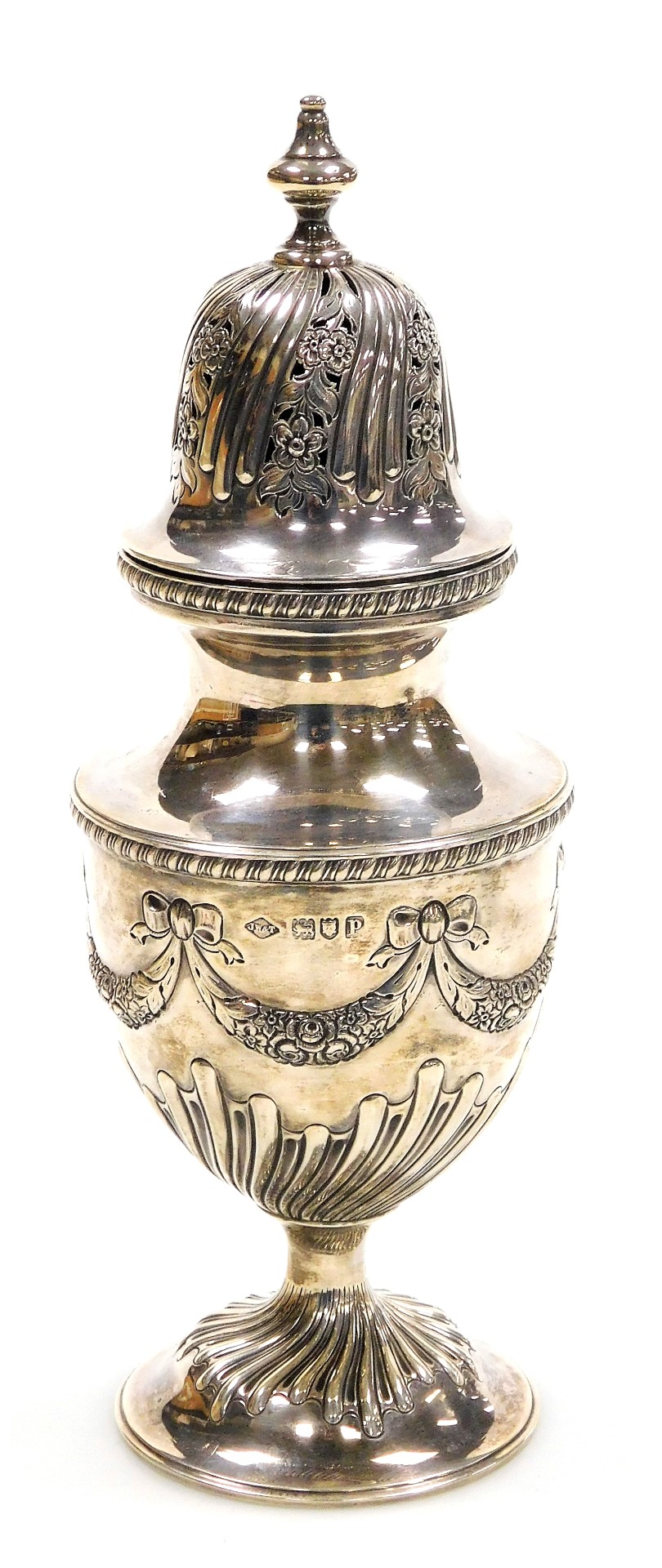 A George V silver sugar sifter, of semi fluted baluster form, embossed with flowers and swags, Johns