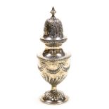 A George V silver sugar sifter, of semi fluted baluster form, embossed with flowers and swags, Johns