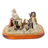 A Capodimonte figure group modelled as Kings For A Day, designed by Roberto Brambilla, raised on an