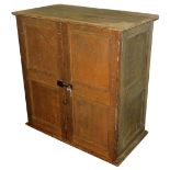 A Victorian pine cupboard, with two doors, raised on a plank base, 102cm high, 98cm wide, 54cm deep.