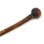 An African wooden Knobkerrie, 82cm high.