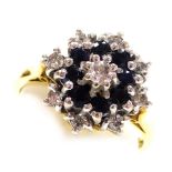 An 18ct gold sapphire and diamond flower head ring, in a basket setting, size O, 6.5g.