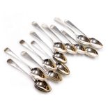 A matched set of George III silver Old English pattern teaspoons, each monogram engraved, assay mark