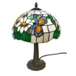 A Tiffany style table lamp, with an opaline glass shade decorated with butterflies and flowers, 46cm