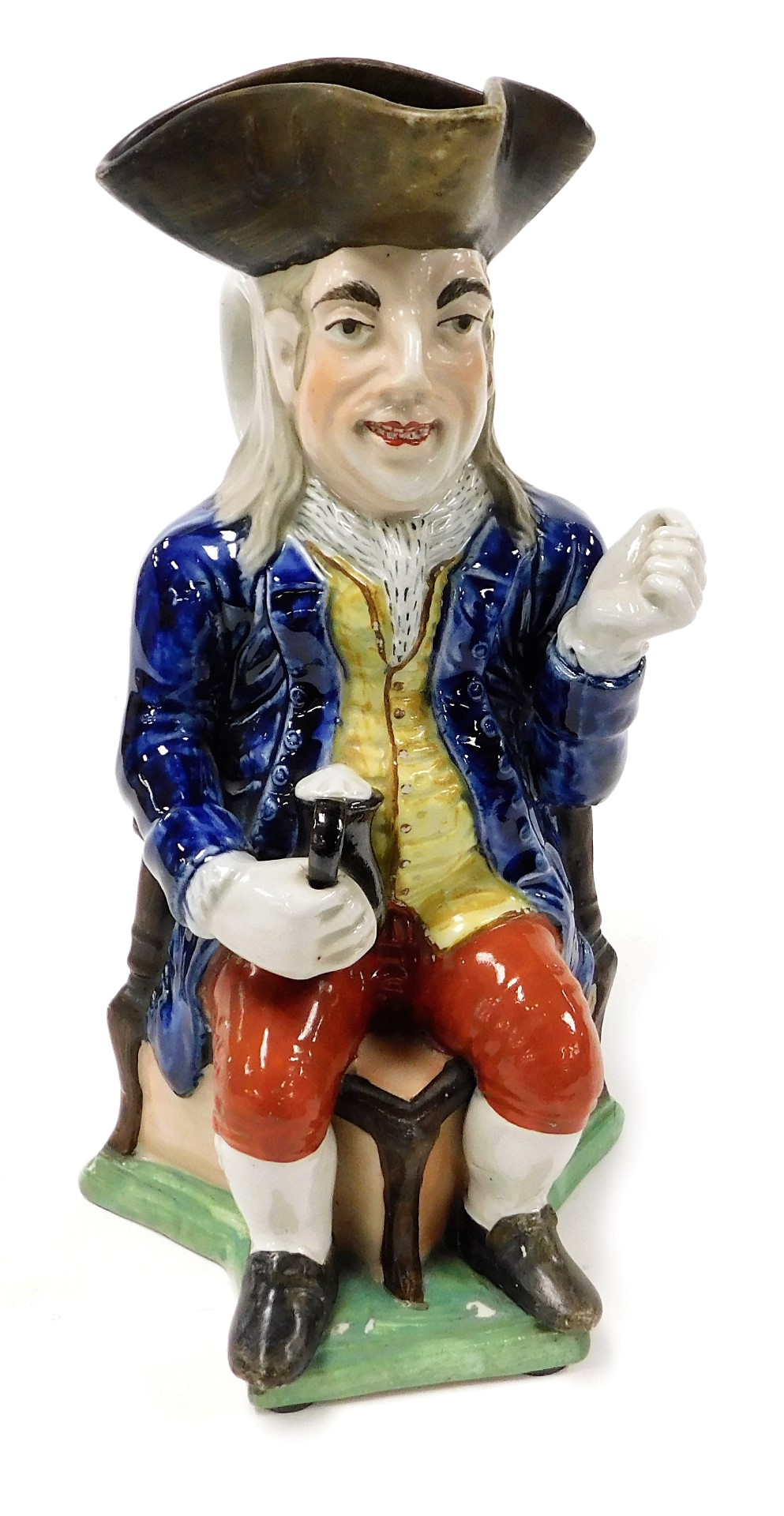 A 19thC pottery character jug modelled as The Squire, 27cm high.
