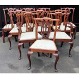 Ten Chippendale style mahogany dining chairs, with drop in seats, raised on cabriole legs, comprisin
