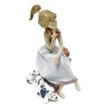 A Lladro porcelain figure of Chit-Chat, 5466, 21cm high, boxed.