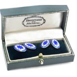 A pair of silver and guilloche enamel double oval and chain link cuff links, decorated in a starburs