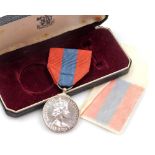 An Elizabeth II Imperial Service medal, cased.