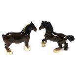 A Beswick Pottery figure of a shire horse, together with a cantering shire horse. (2)