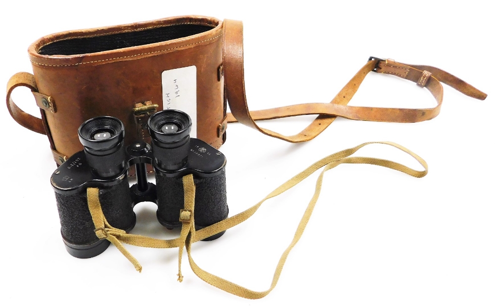 A pair of WWII military field binoculars, 6.E/293x6, dated 1944, no.13871, with a matched case.