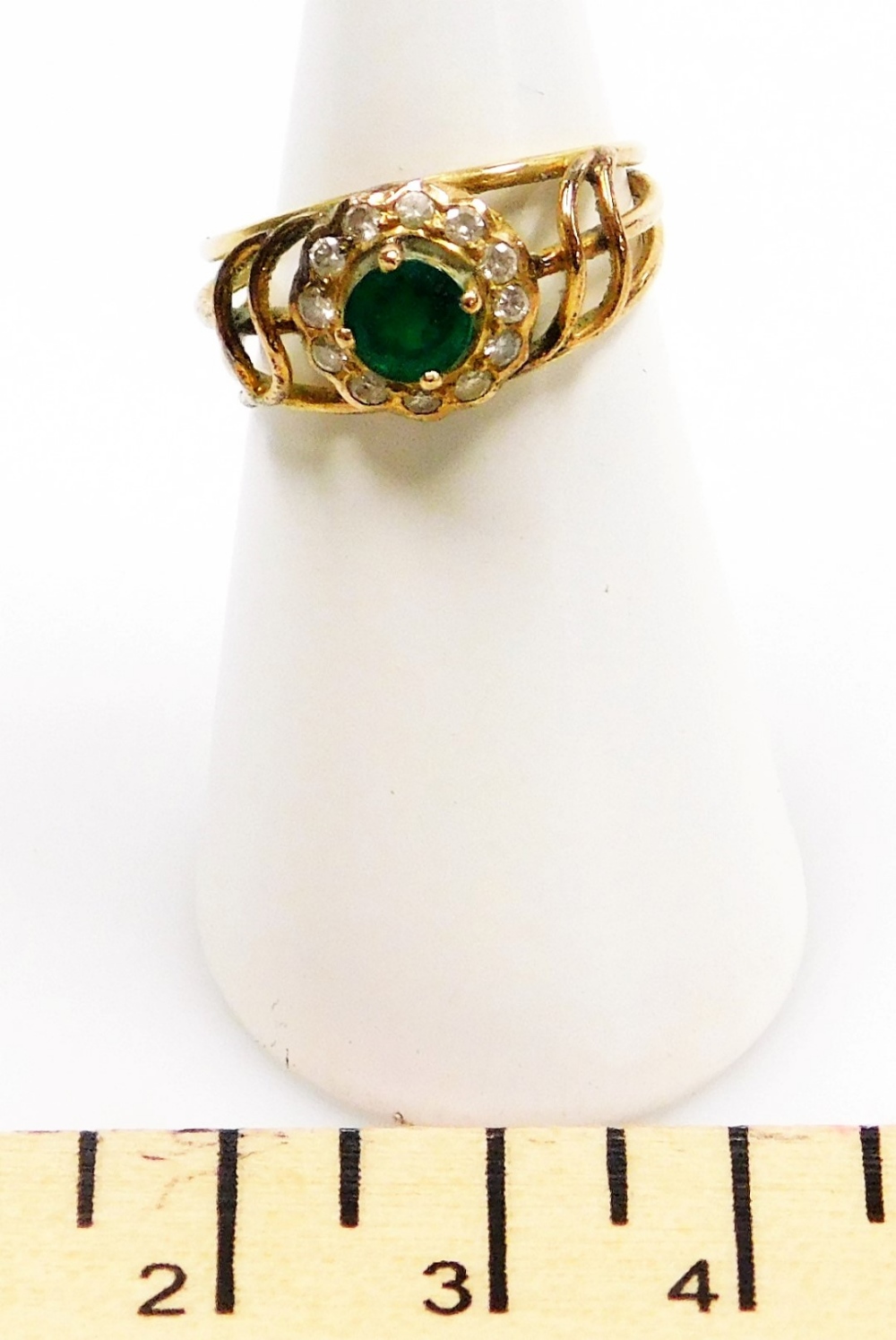 An emerald and diamond set dress ring, openwork design, a central round 4.9mm diameter emerald (heav - Image 2 of 2