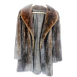 A lady's mink waist length fur coat, under arm measurement 58cm wide.