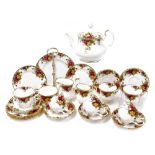 A Royal Albert Old Country Rose porcelain part tea service, comprising a teapot, two graduated cream