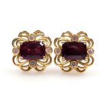 A pair of tourmaline and diamond ornate earrings, the rectangular faceted stone of 8mm x 5.9mm with