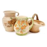 Three items of Crown Ducal Charlotte Rhead pottery, comprising a jug of ribbed form decorated with l