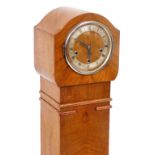 A 1930's Enfield walnut cased grandmother clock, the dial with silverered chapter ring bearing Roman