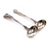 A Victorian silver King's pattern cream ladle, maker's mark indistinct, London 1865, together with a