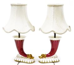 A pair of Coalport porcelain cornucopia vases, converted to table lamps, of fluted form terminating