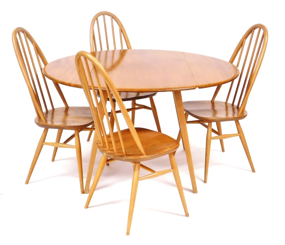 An Ercol light elm drop leaf dining table, raised on outswept square legs, 71cm high, 63cm wide, 121