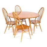 An Ercol light elm drop leaf dining table, raised on outswept square legs, 71cm high, 63cm wide, 121